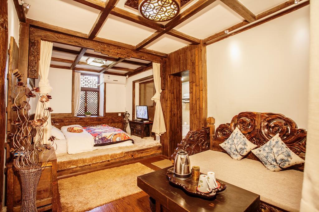 XI Tang Exquisite Hotel Lijiang  Rum bild
