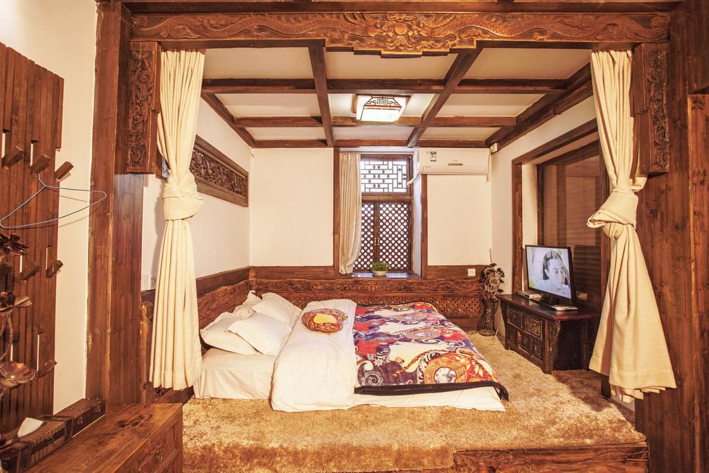 XI Tang Exquisite Hotel Lijiang  Rum bild