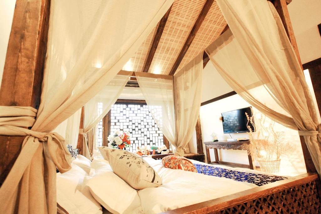 XI Tang Exquisite Hotel Lijiang  Rum bild