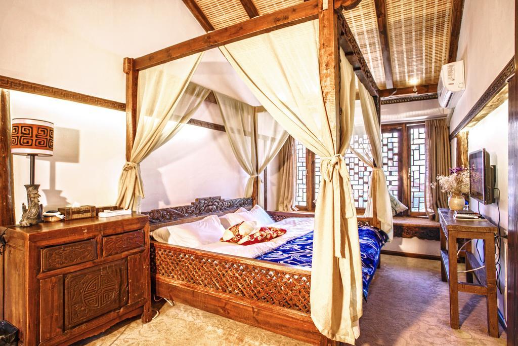 XI Tang Exquisite Hotel Lijiang  Rum bild